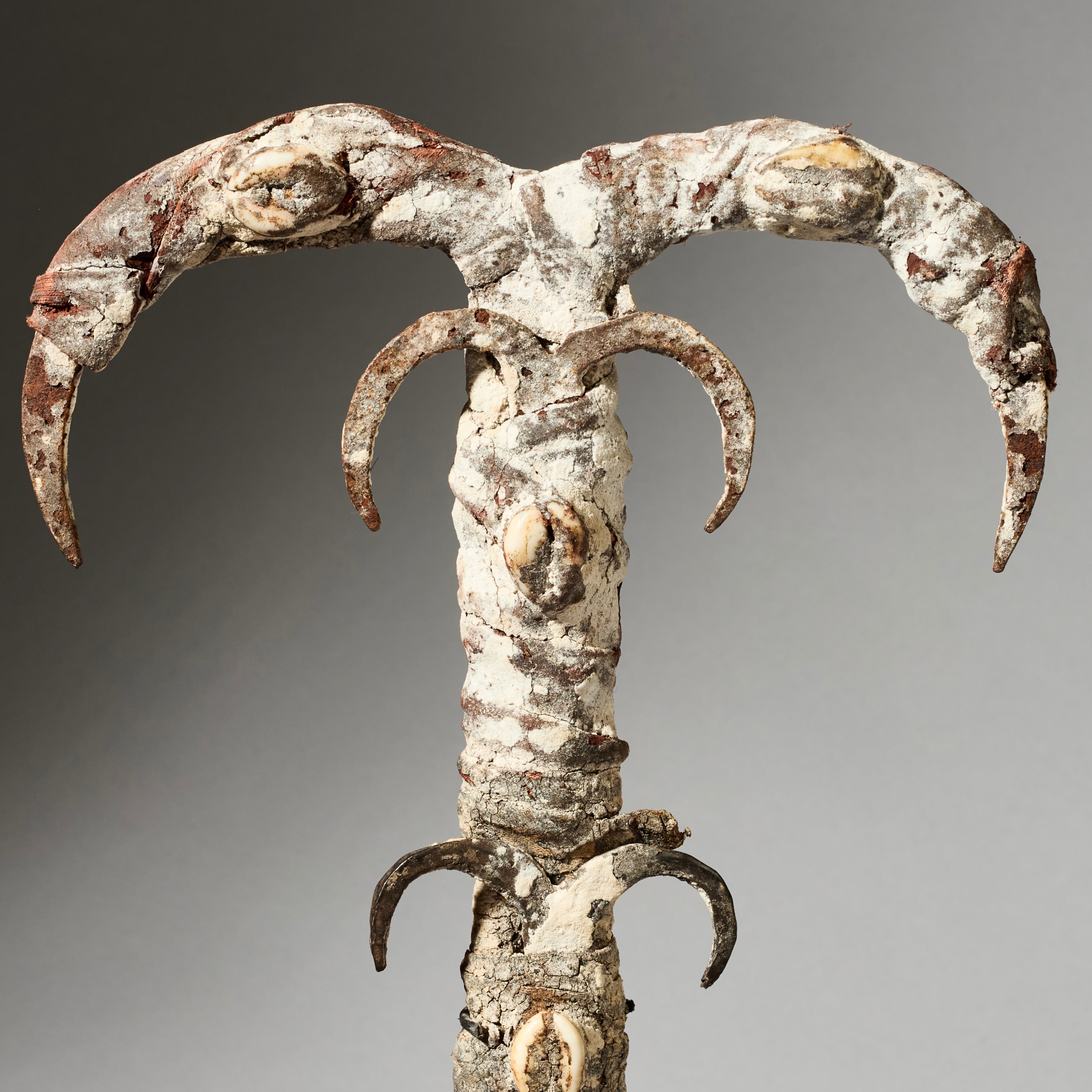 A IRON FIGURE TALISMAN FROM EWE TRIBE OF TOGO , ENCRUSTED WITH COWRIES AND IRON  ( No 4930