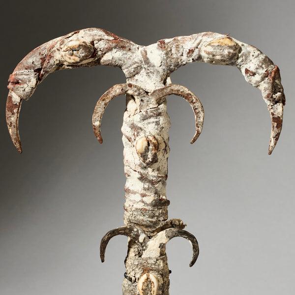 A IRON FIGURE TALISMAN FROM EWE TRIBE OF TOGO , ENCRUSTED WITH COWRIES AND IRON  ( No 4930