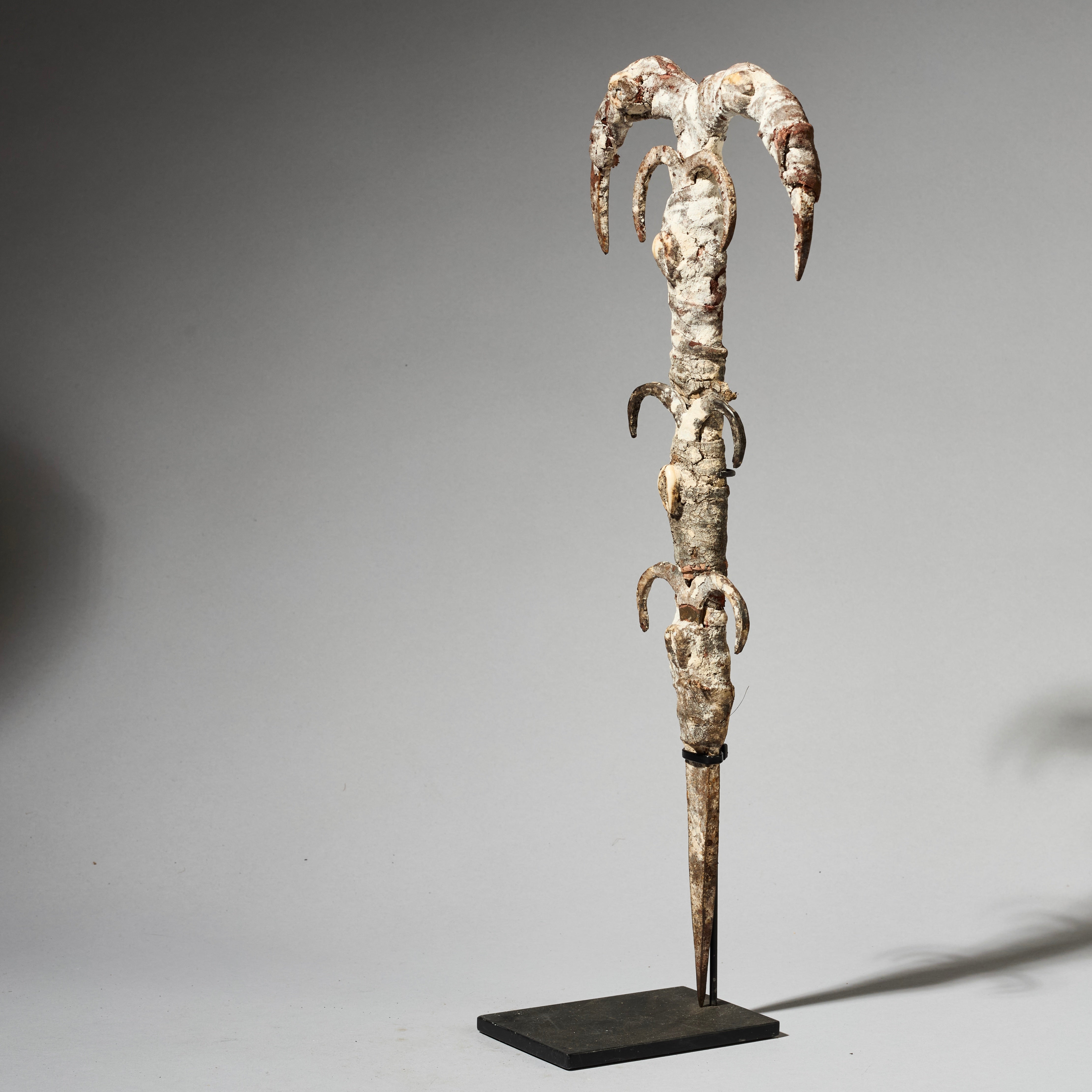 A IRON FIGURE TALISMAN FROM EWE TRIBE OF TOGO , ENCRUSTED WITH COWRIES AND IRON  ( No 4930