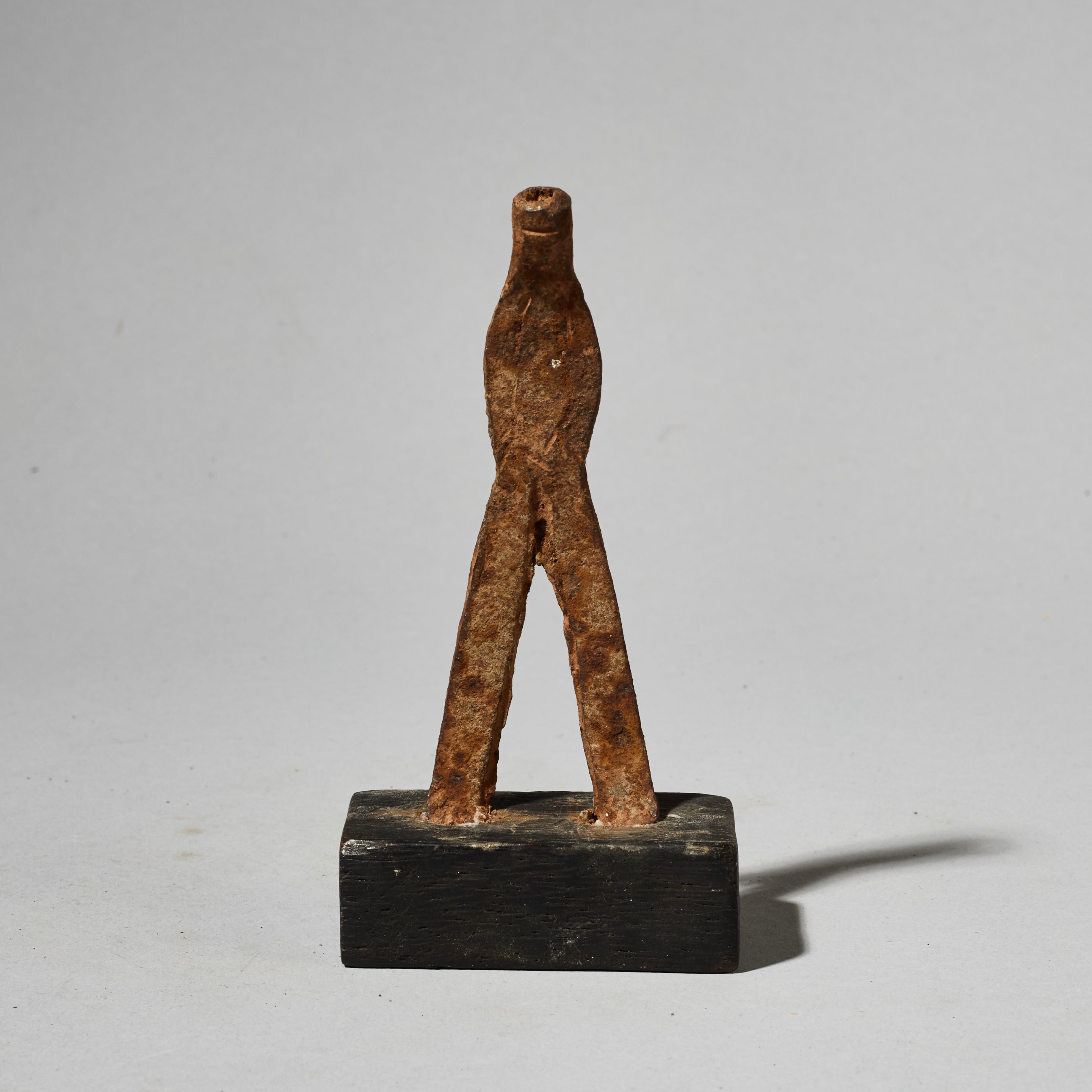 A SMALL IRON FIGURE  FROM LOBI TRIBE BURKINA FASO ( No 4929]