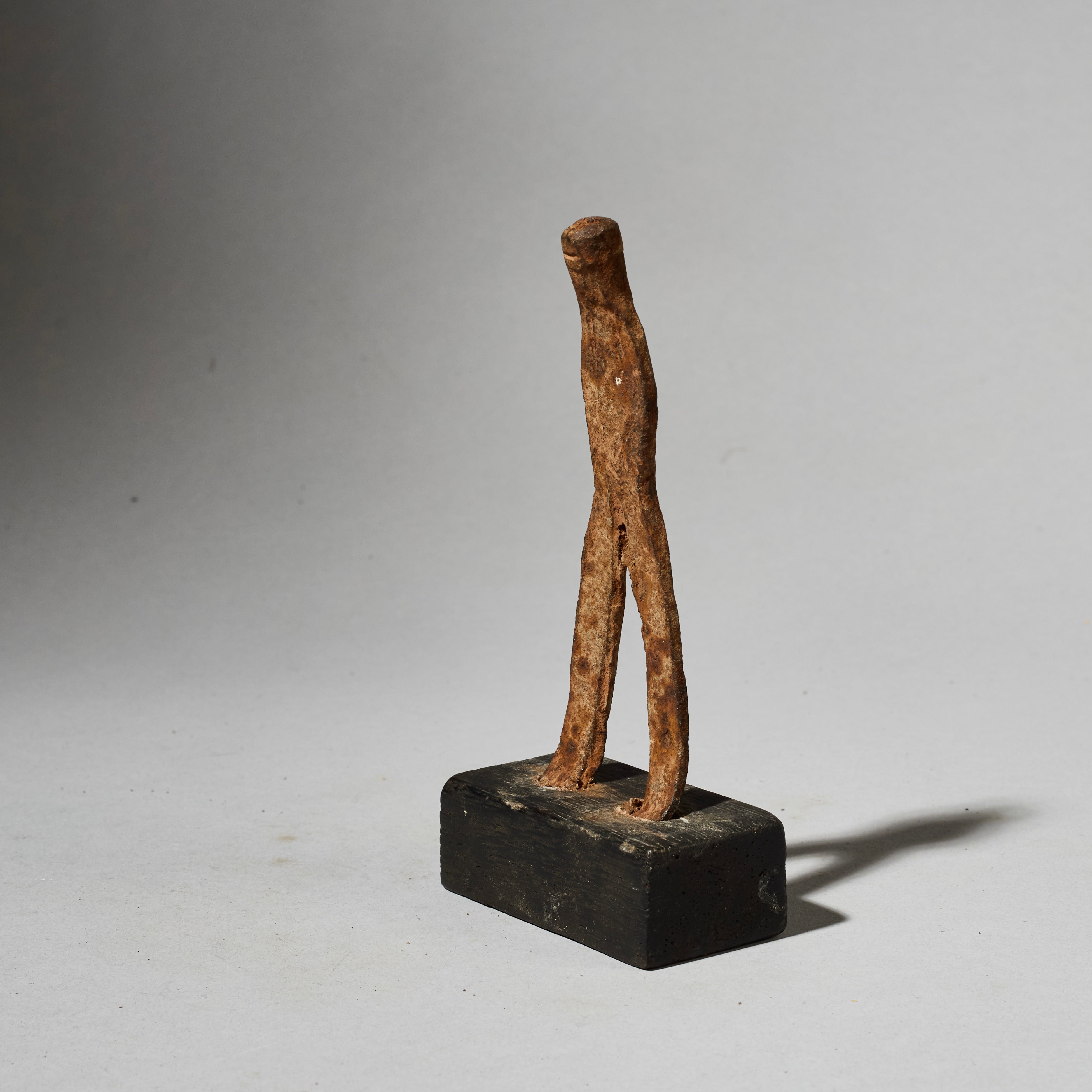 A SMALL IRON FIGURE  FROM LOBI TRIBE BURKINA FASO ( No 4929]