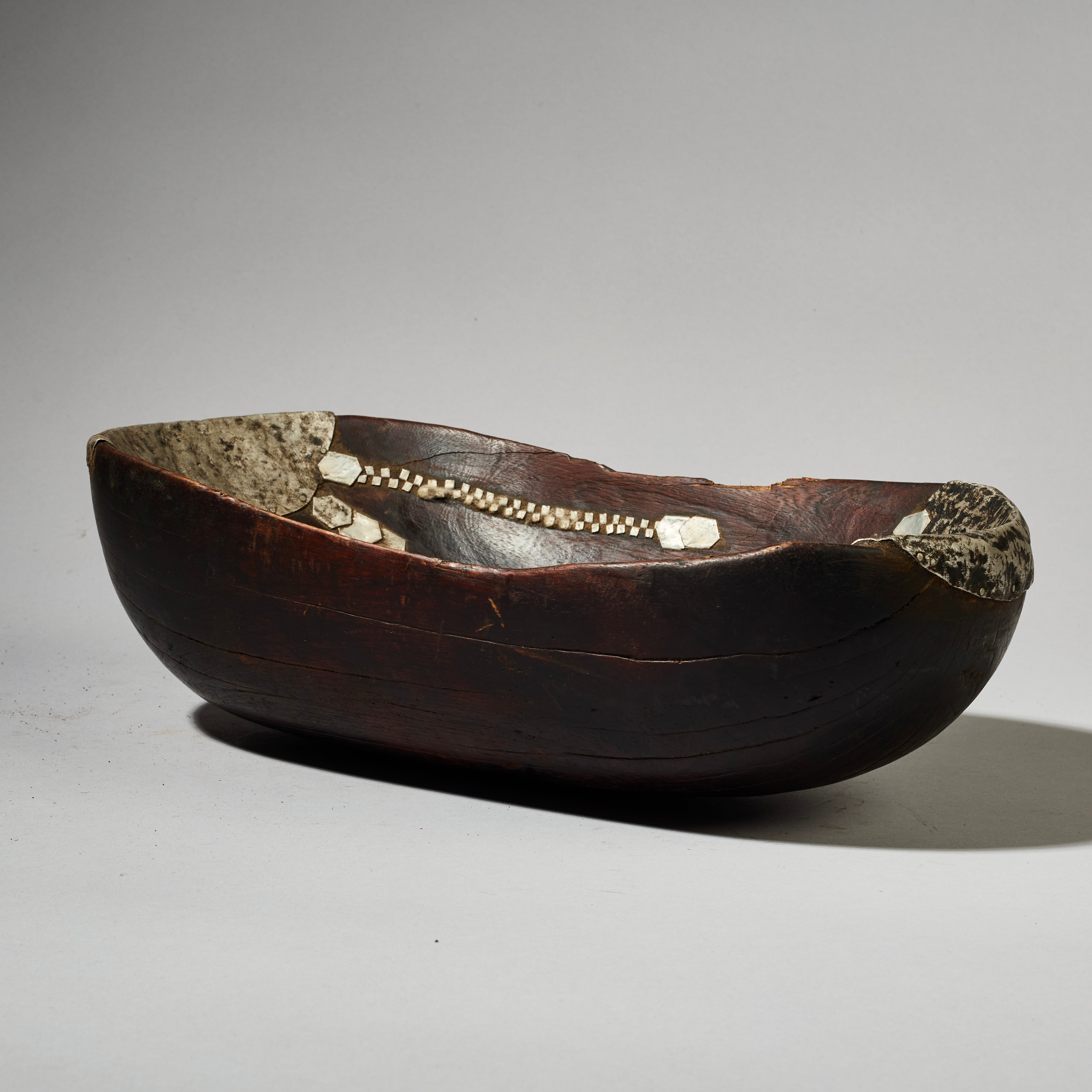 A UNIQUELY REPAIRED, WELL PATINATED BOWL, FROM TUTSI TRIBE OF RWANDA ( No 4741 )