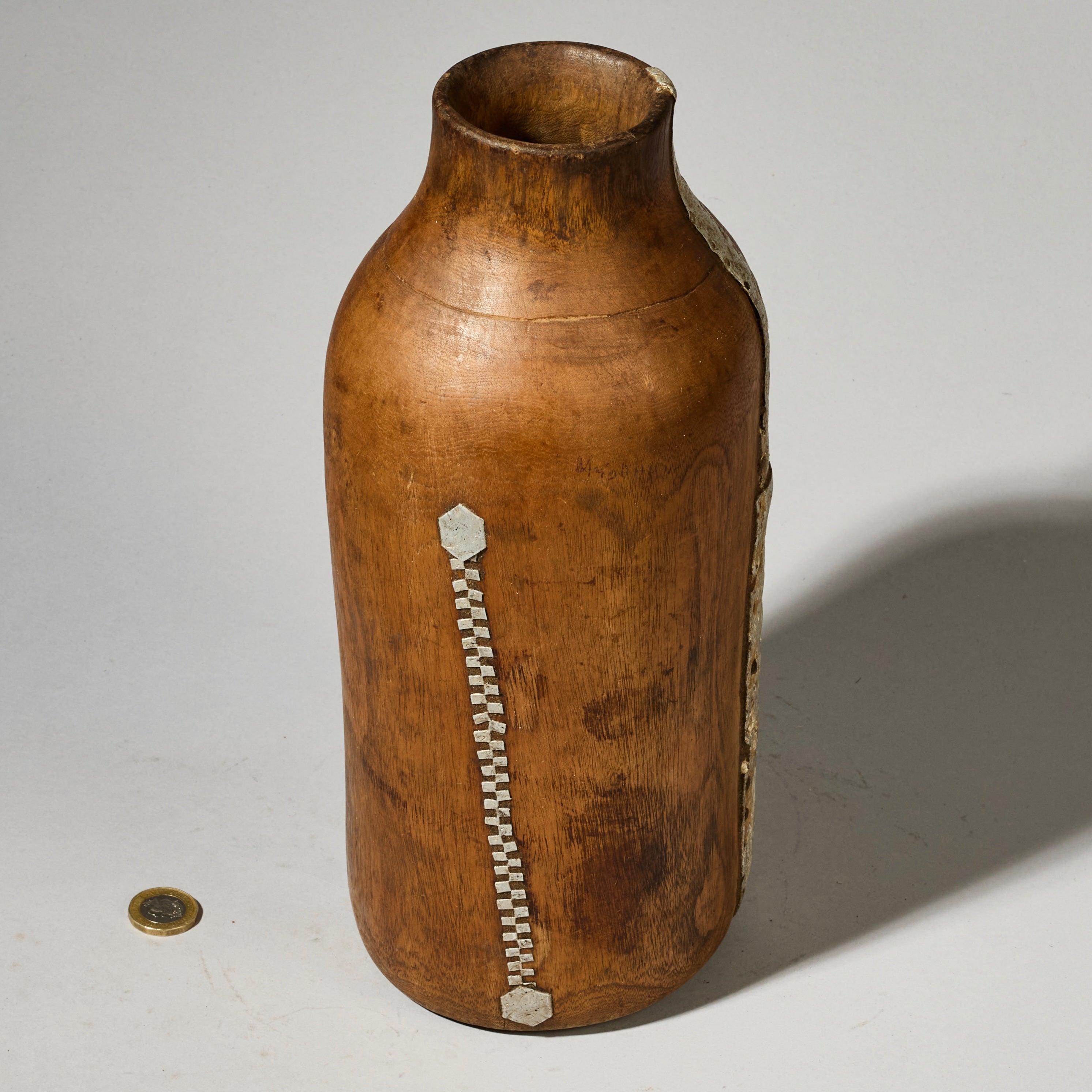A HAND HEWN MEDIUM HONEY POT WITH METAL REPAIRS, TUTSI TRIBE RWANDA( No 4744 )
