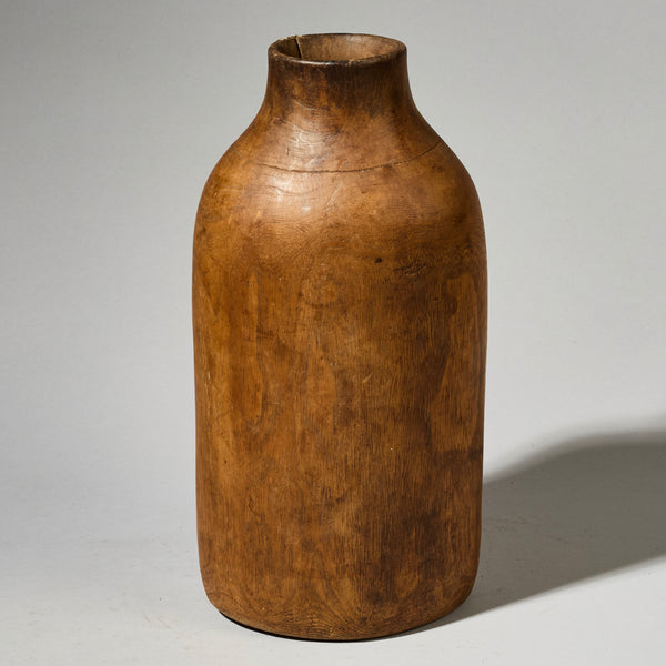A HAND HEWN MEDIUM HONEY POT WITH METAL REPAIRS, TUTSI TRIBE RWANDA( No 4744 )