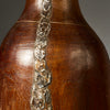A LARGE  CHUNKY HONEY POT WITH METAL INDIGENOUS REPAIRS FROM THE TUTSI TRIBE OF RWANDA ( No 4908 )