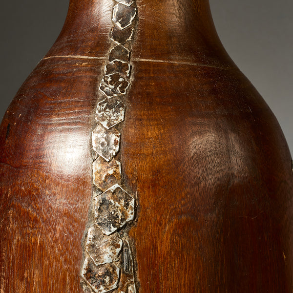 A LARGE  CHUNKY HONEY POT WITH METAL INDIGENOUS REPAIRS FROM THE TUTSI TRIBE OF RWANDA ( No 4908 )
