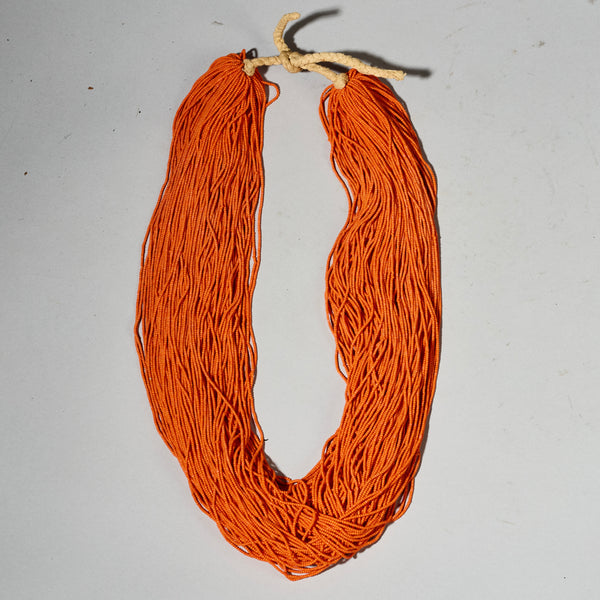 AN ORANGE MULTISTRAND NECKLACE,  BAULE TRIBE IVORY COAST ( No 4926