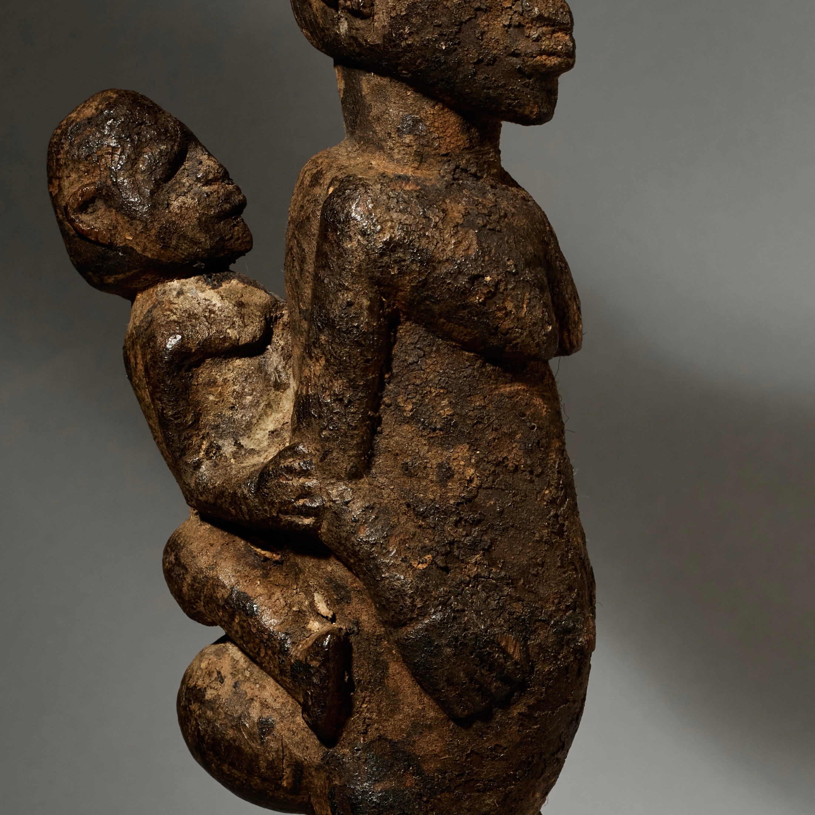 A RARE ENCRUSTED MATERNITY FIGURE, LOBI TRIBE BURKINA FASO ( No 5002 )