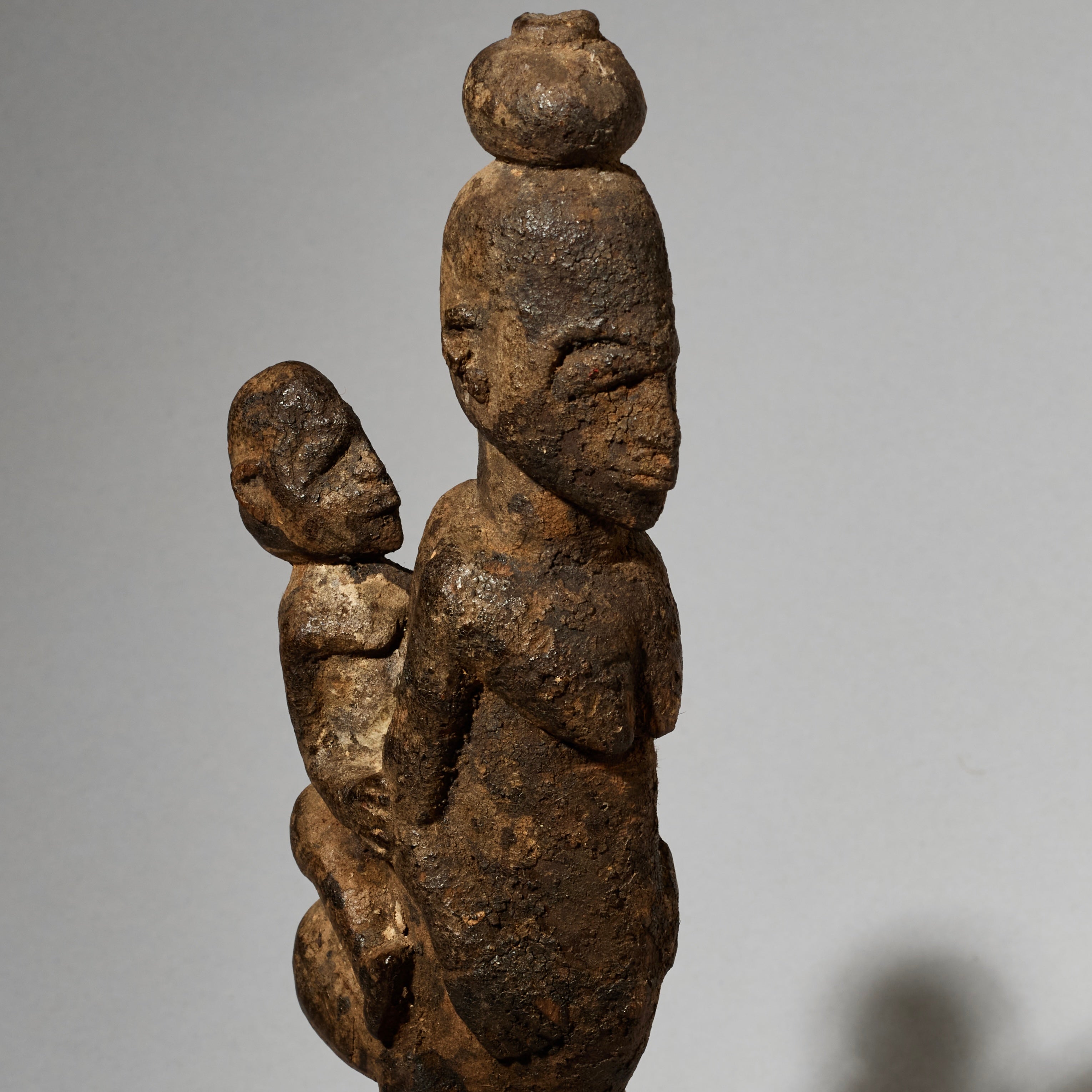 A RARE ENCRUSTED MATERNITY FIGURE, LOBI TRIBE BURKINA FASO ( No 5002 )