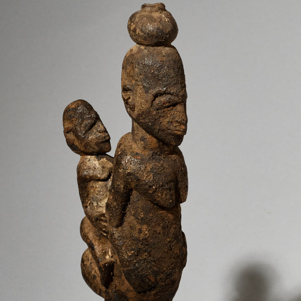 A RARE ENCRUSTED MATERNITY FIGURE, LOBI TRIBE BURKINA FASO ( No 5002 )