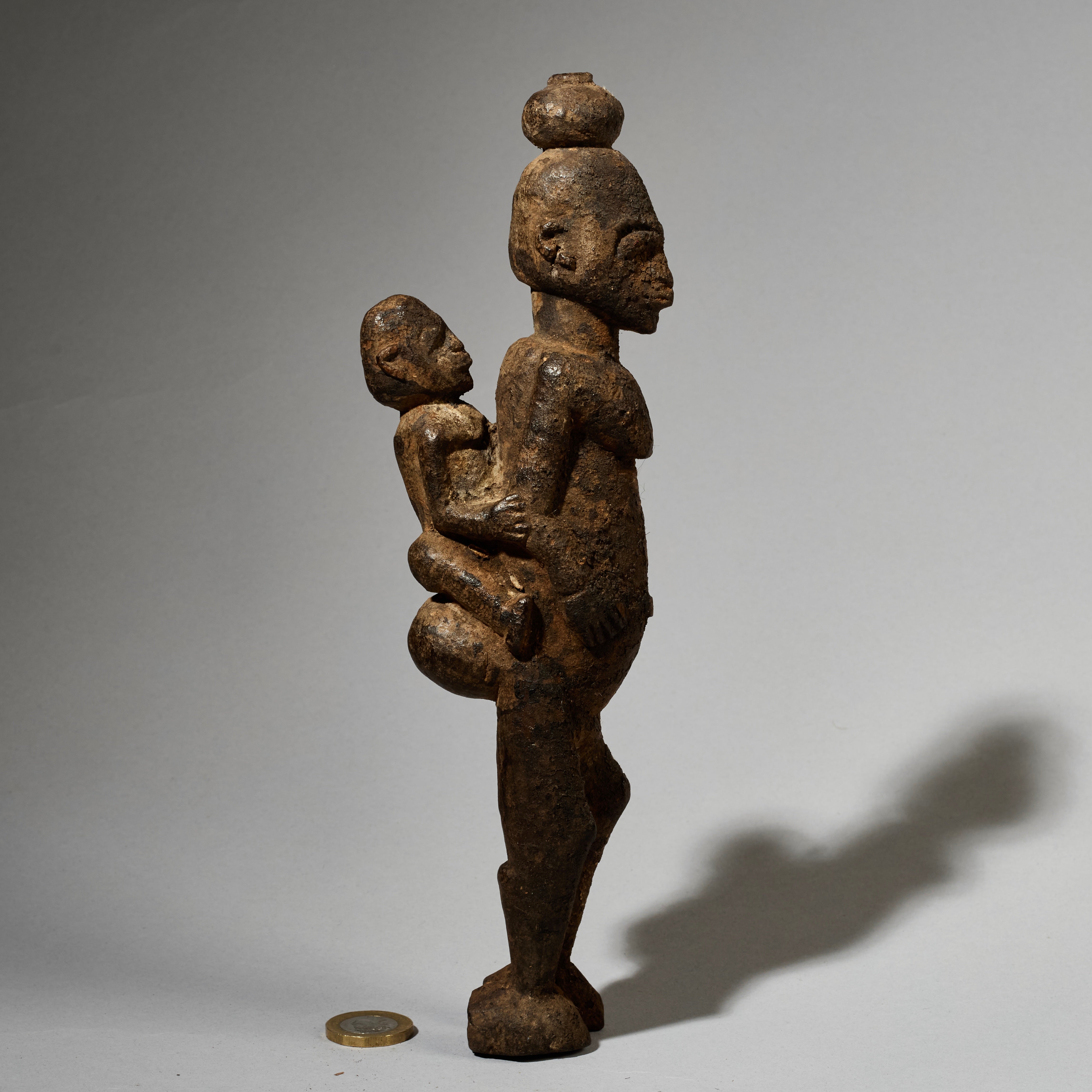 A RARE ENCRUSTED MATERNITY FIGURE, LOBI TRIBE BURKINA FASO ( No 5002 )