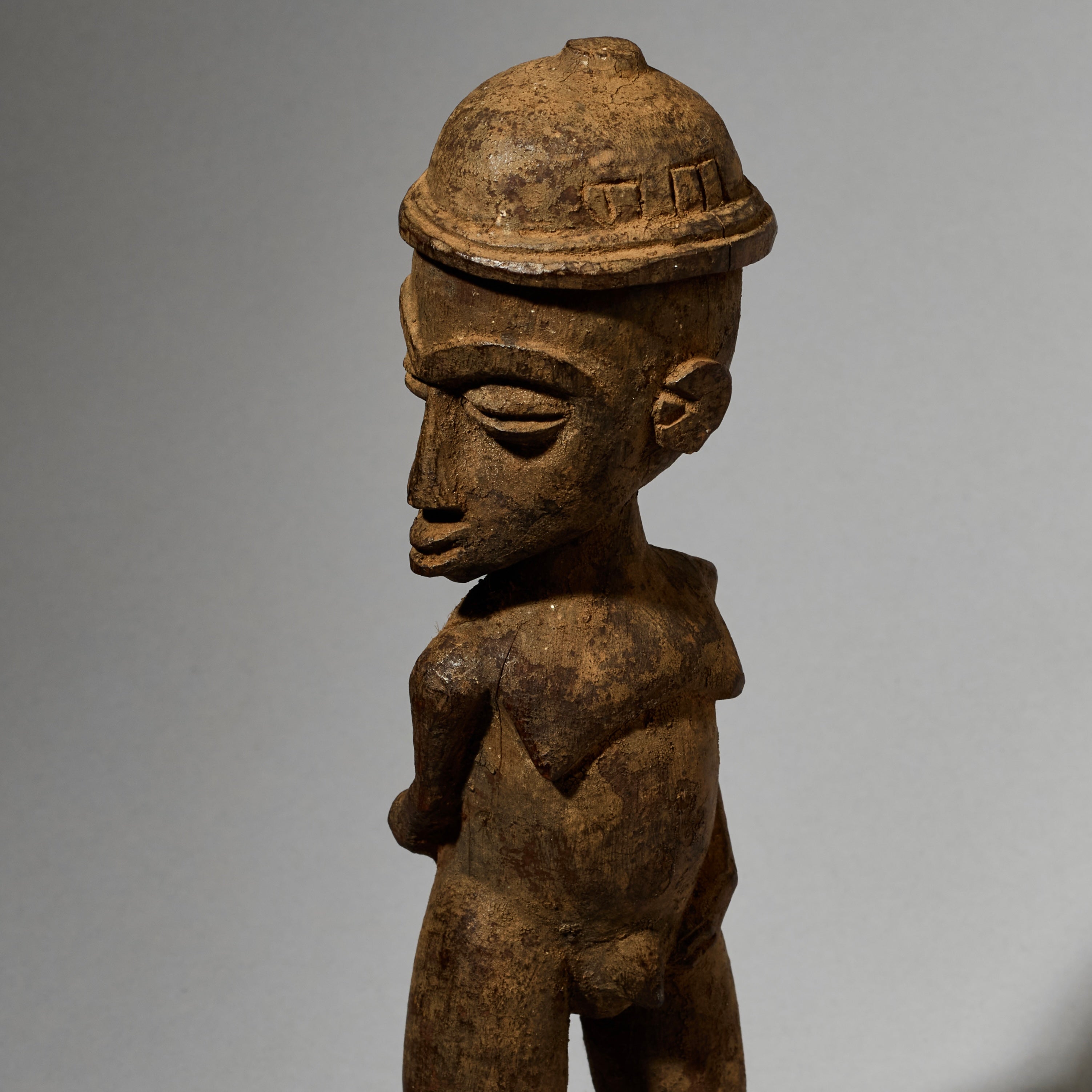 A DYNAMIC LOBI TRIBE THIL STATUE WITH UNUSUAL FEATURES AND SIDEWAYS FORM  ( No 5001)