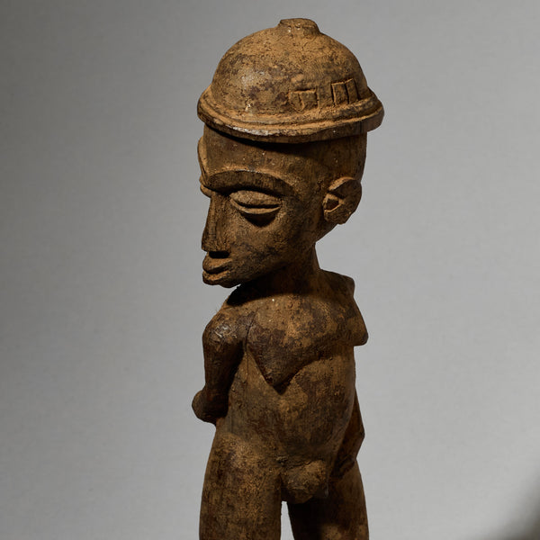 A DYNAMIC LOBI TRIBE THIL STATUE WITH UNUSUAL FEATURES AND SIDEWAYS FORM  ( No 5001)