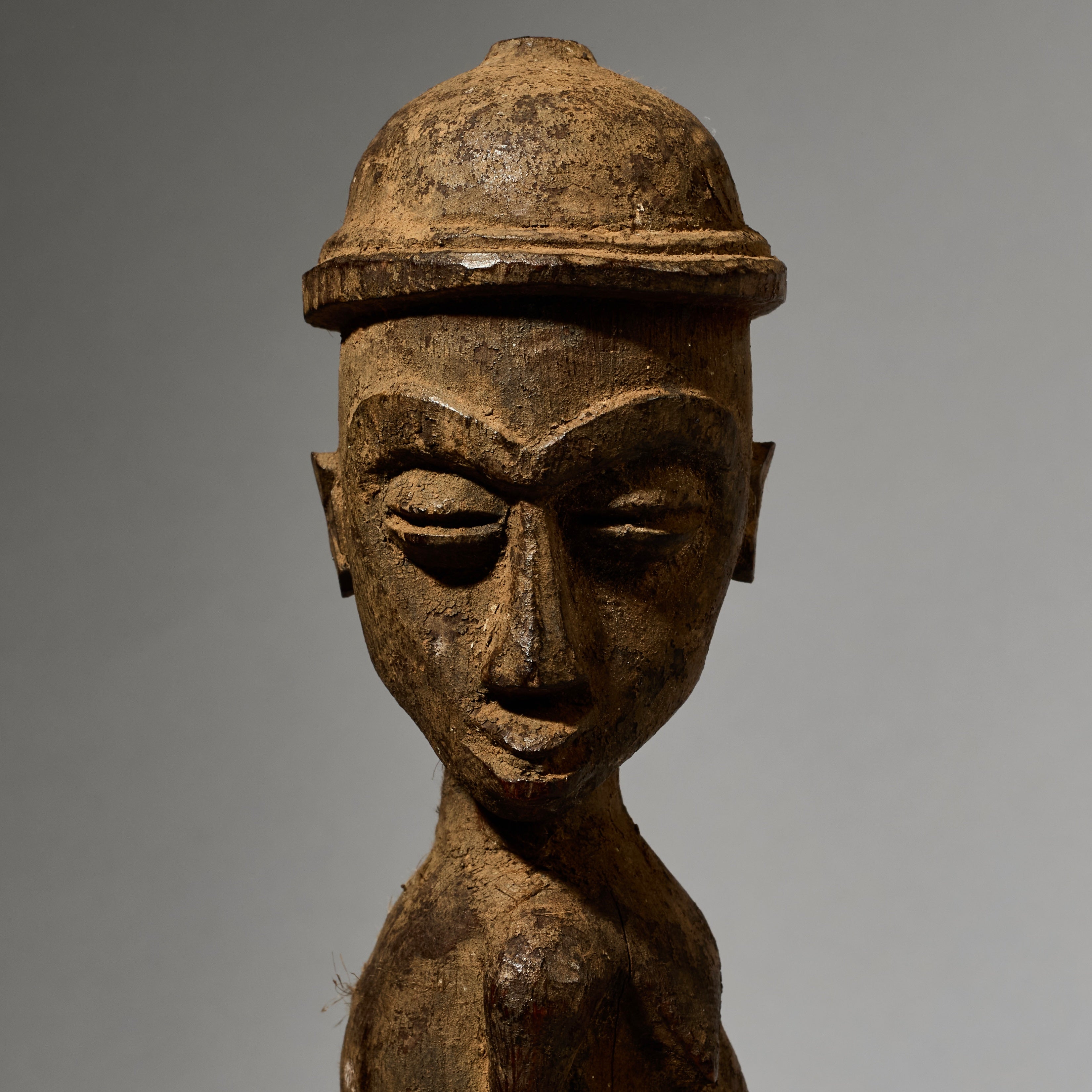 A DYNAMIC LOBI TRIBE THIL STATUE WITH UNUSUAL FEATURES AND SIDEWAYS FORM  ( No 5001)