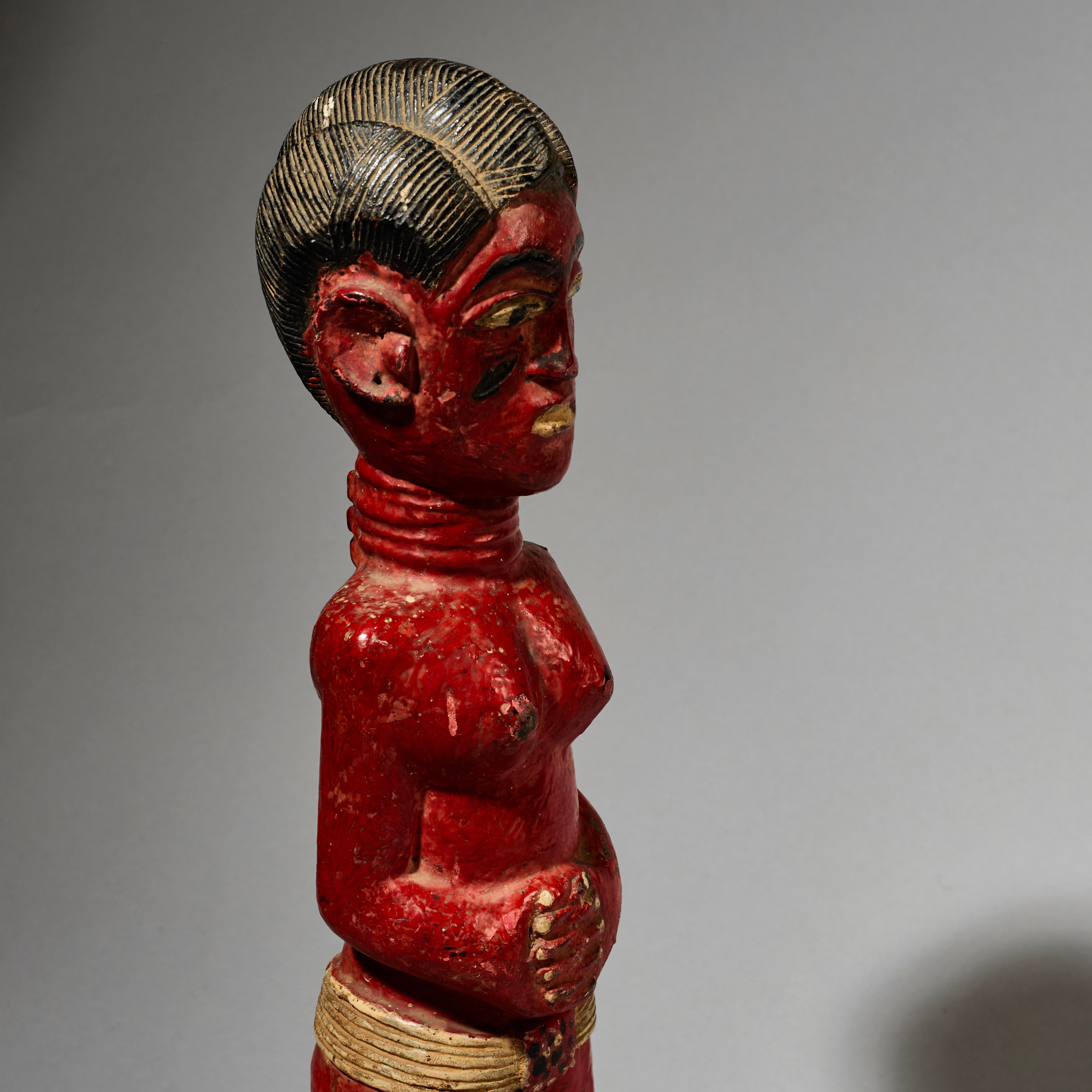 AN EXPRESSIVE RED FEMALE COLON FIGURE WITH FINE FINGERS, BAULE TRIBE IVORY COAST ( No 4998 )