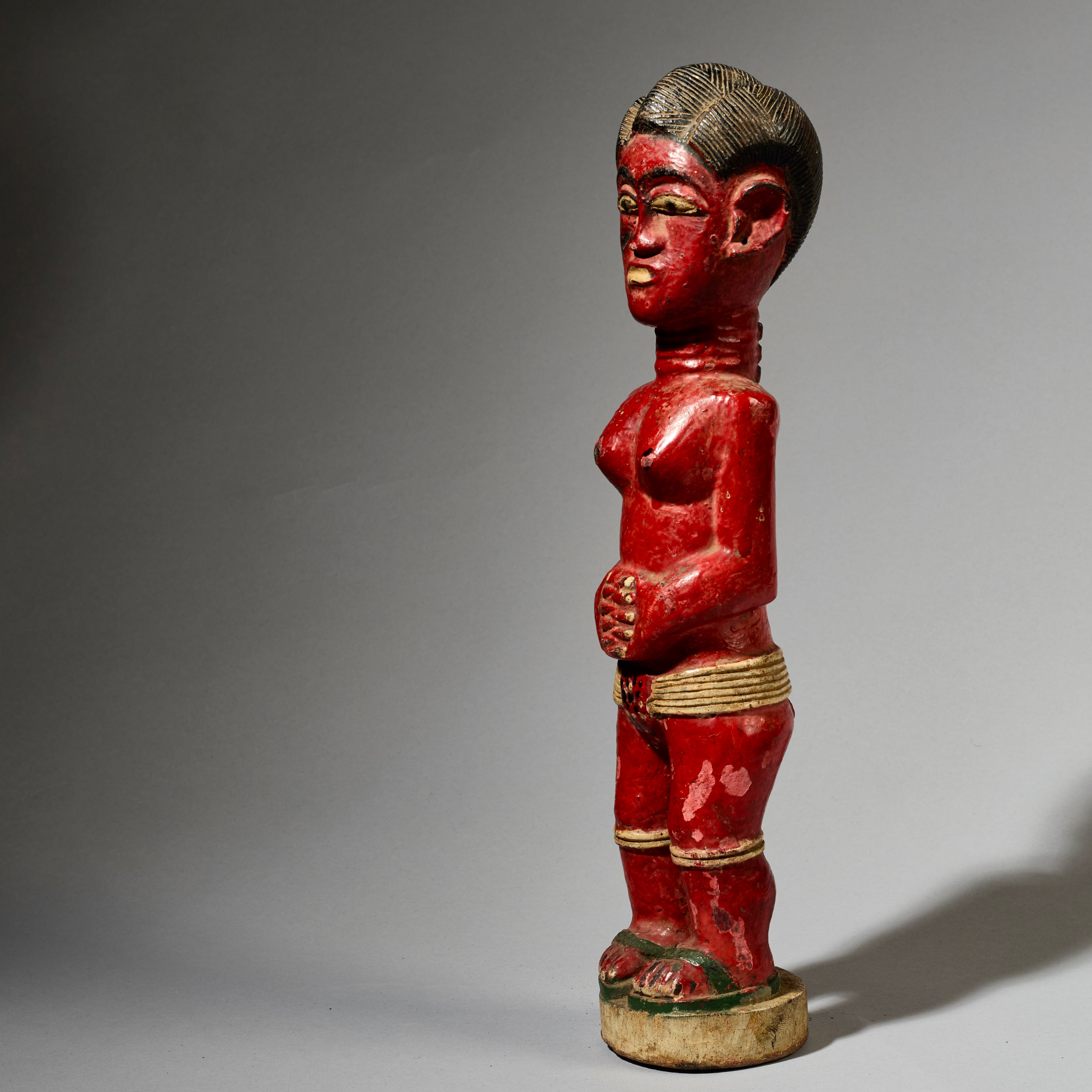 AN EXPRESSIVE RED FEMALE COLON FIGURE WITH FINE FINGERS, BAULE TRIBE IVORY COAST ( No 4998 )