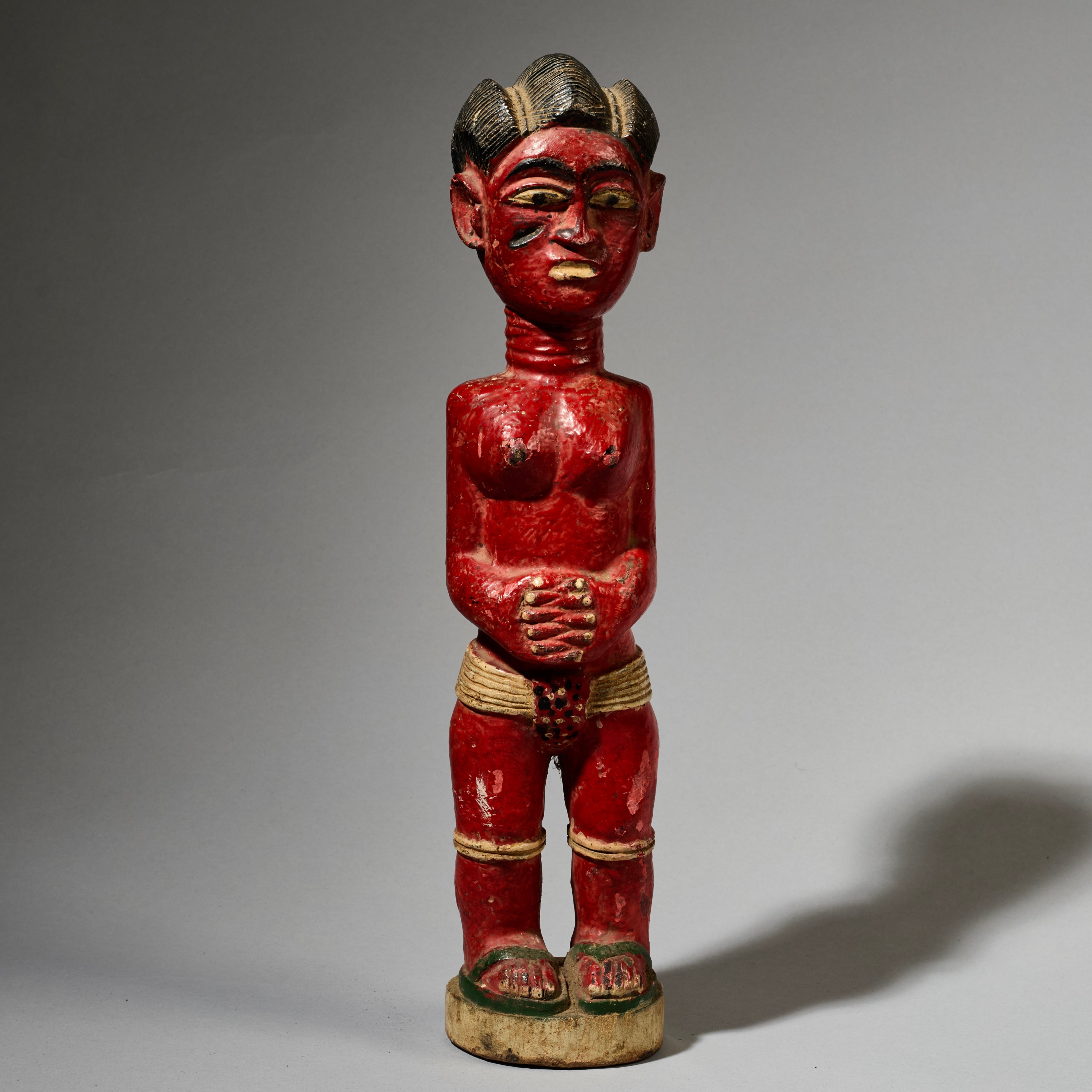AN EXPRESSIVE RED FEMALE COLON FIGURE WITH FINE FINGERS, BAULE TRIBE IVORY COAST ( No 4998 )