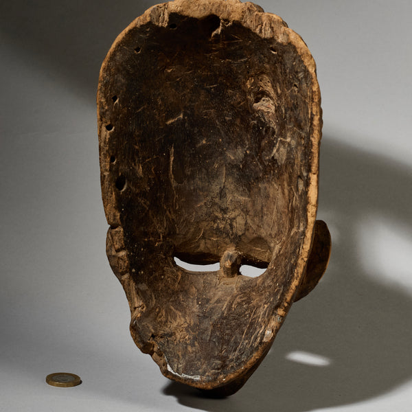 A QUIRKY WELL USED MASK FROM BURKINA FASO  ( No 5034 )
