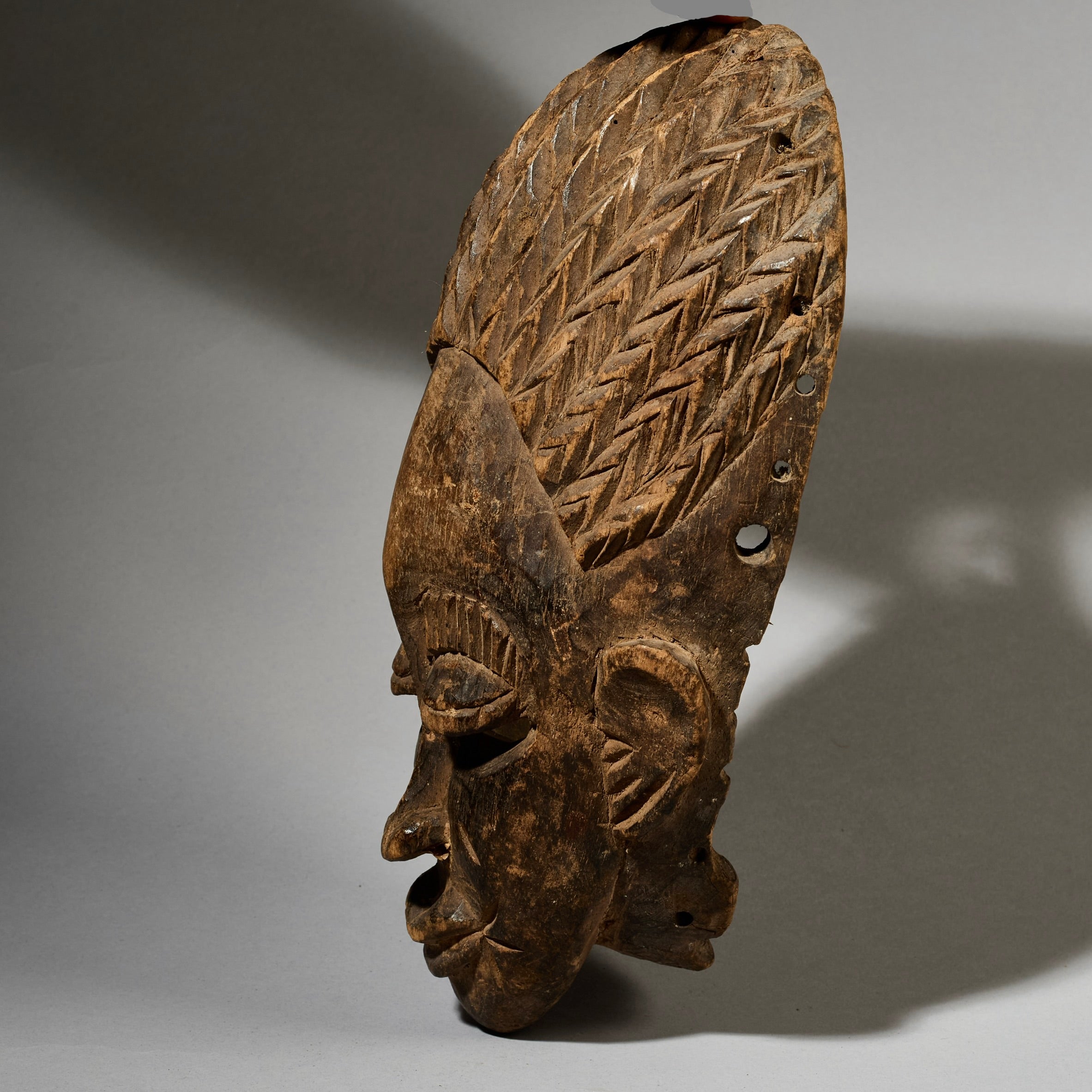 A QUIRKY WELL USED MASK FROM BURKINA FASO  ( No 5034 )