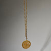 A BOLD  BAULE GILT BRASS NECKLACE WITH GOLD WEIGHT SHAPED DISC PENDANT, IVORY COAST (  No 4980
