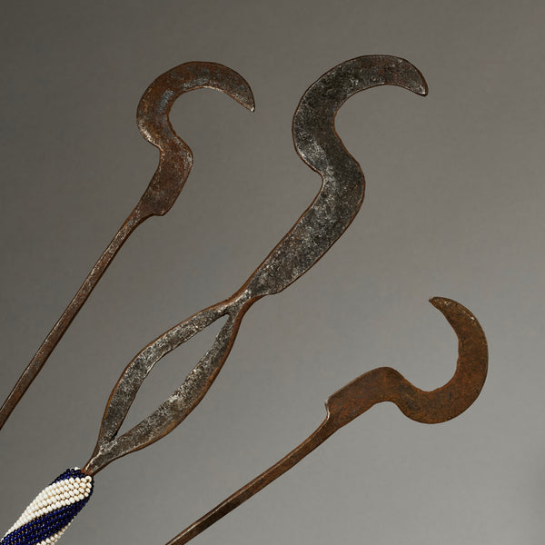 A TRIO OF CEREMONIAL SYTHES FROM THE TUTSI TRIBE OF RWANDA ( No 5026 )