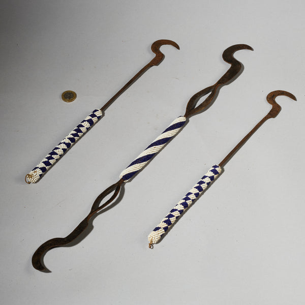 A TRIO OF CEREMONIAL SYTHES FROM THE TUTSI TRIBE OF RWANDA ( No 5026 )