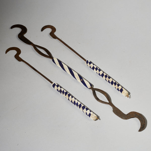 A TRIO OF CEREMONIAL SYTHES FROM THE TUTSI TRIBE OF RWANDA ( No 5026 )