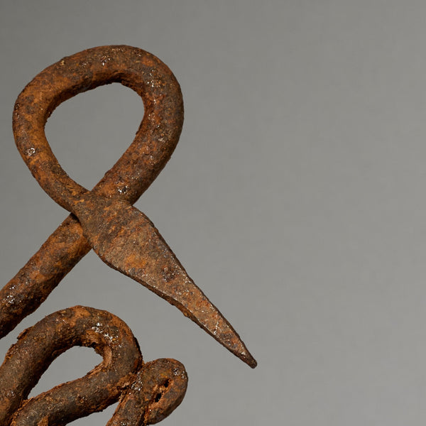 AN OXIDISED IRON SNAKE TALISMAN FROM THE LOBI TRIBE OF BURKINA FASO ( No 5027 )