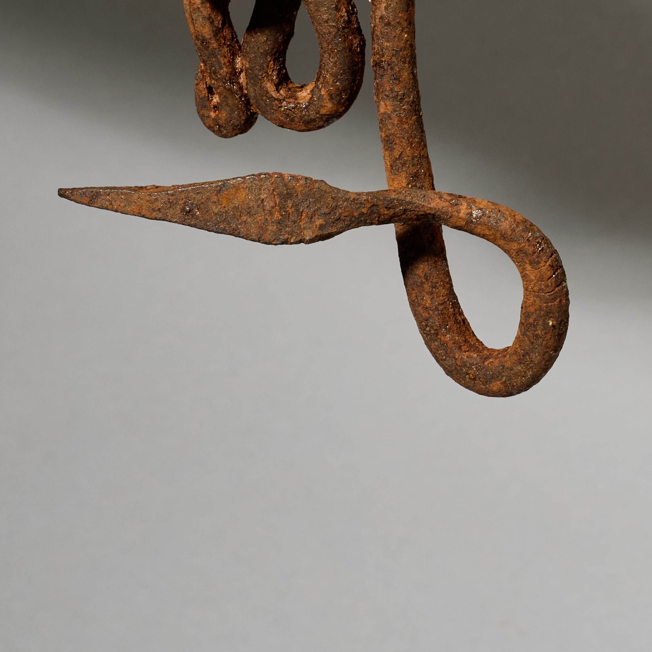 AN OXIDISED IRON SNAKE TALISMAN FROM THE LOBI TRIBE OF BURKINA FASO ( No 5027 )
