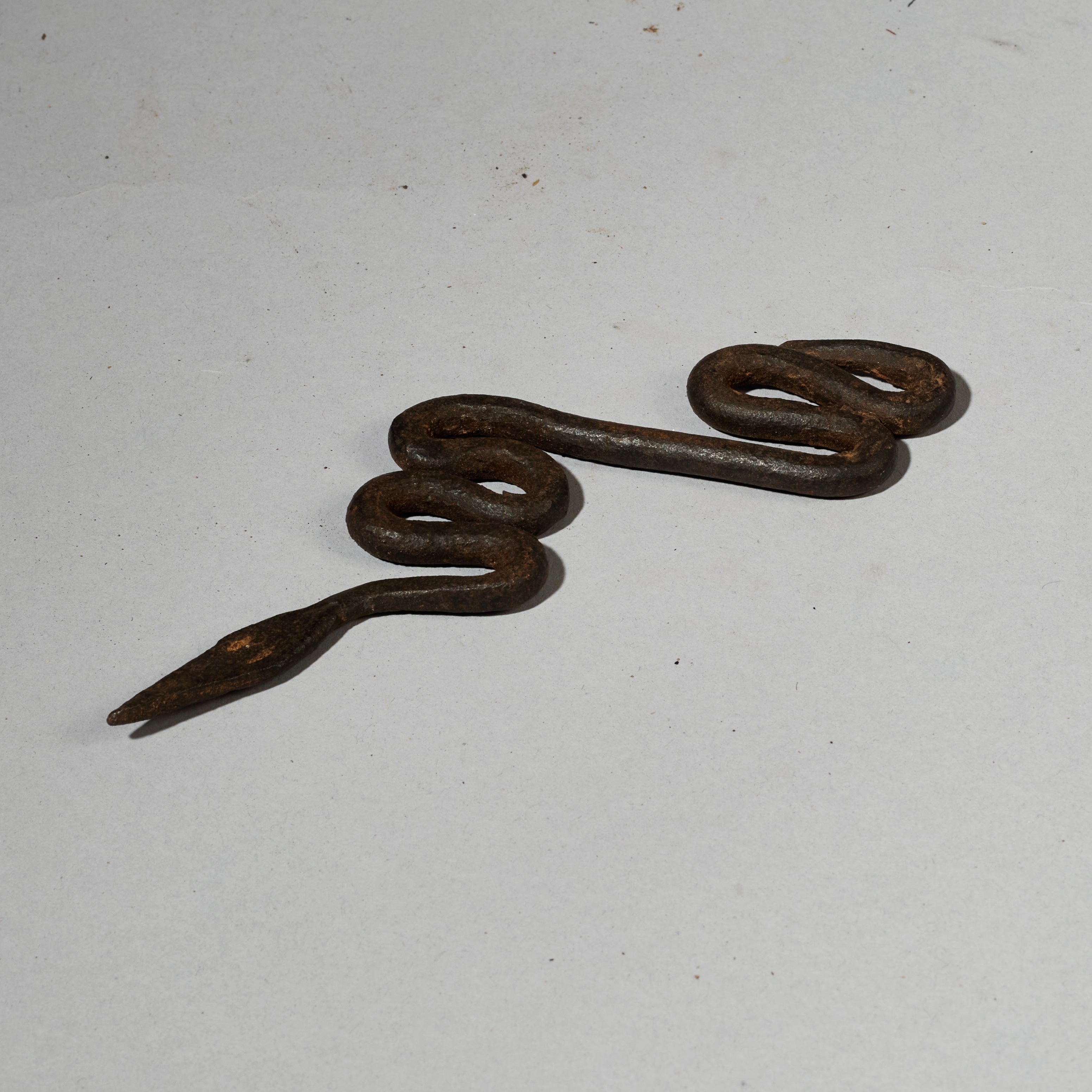 A SERPENTINE IRON SNAKE TALISMAN FROM THE LOBI TRIBE OF BURKINA FASO ( No 5025)