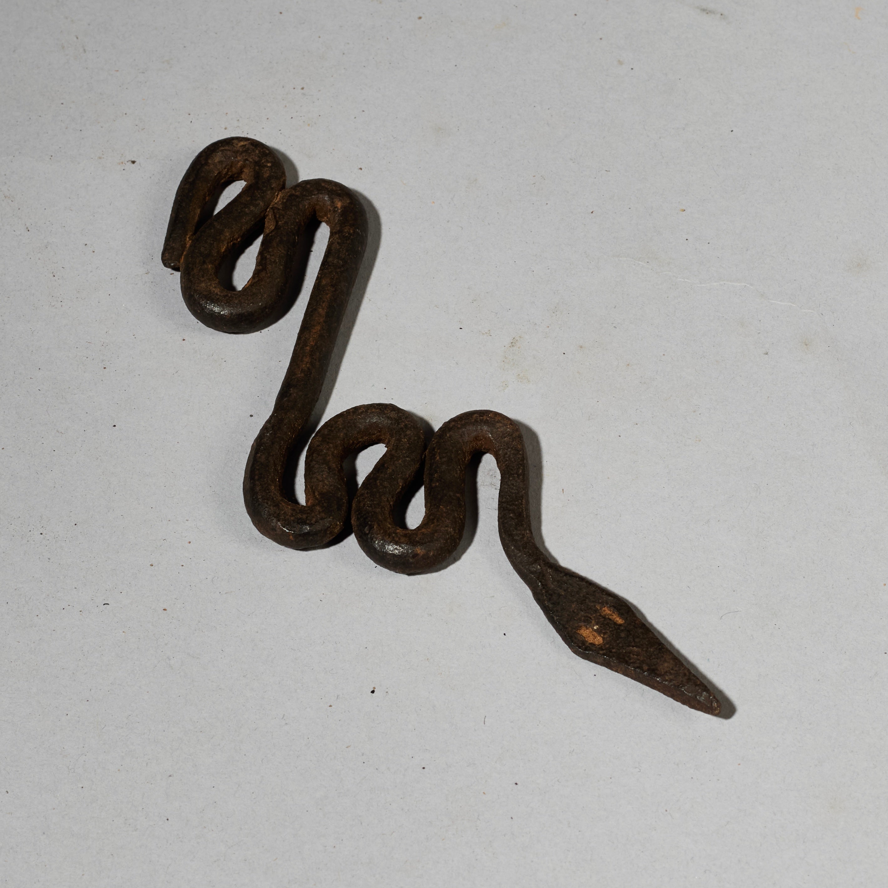 A SERPENTINE IRON SNAKE TALISMAN FROM THE LOBI TRIBE OF BURKINA FASO ( No 5025)