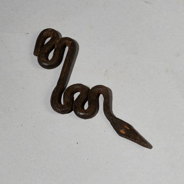 A SERPENTINE IRON SNAKE TALISMAN FROM THE LOBI TRIBE OF BURKINA FASO ( No 5025)