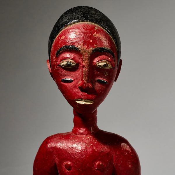 A SCULPTURAL RED COLON FIGURE, BAULE TRIBE IVORY COAST ( No 5000