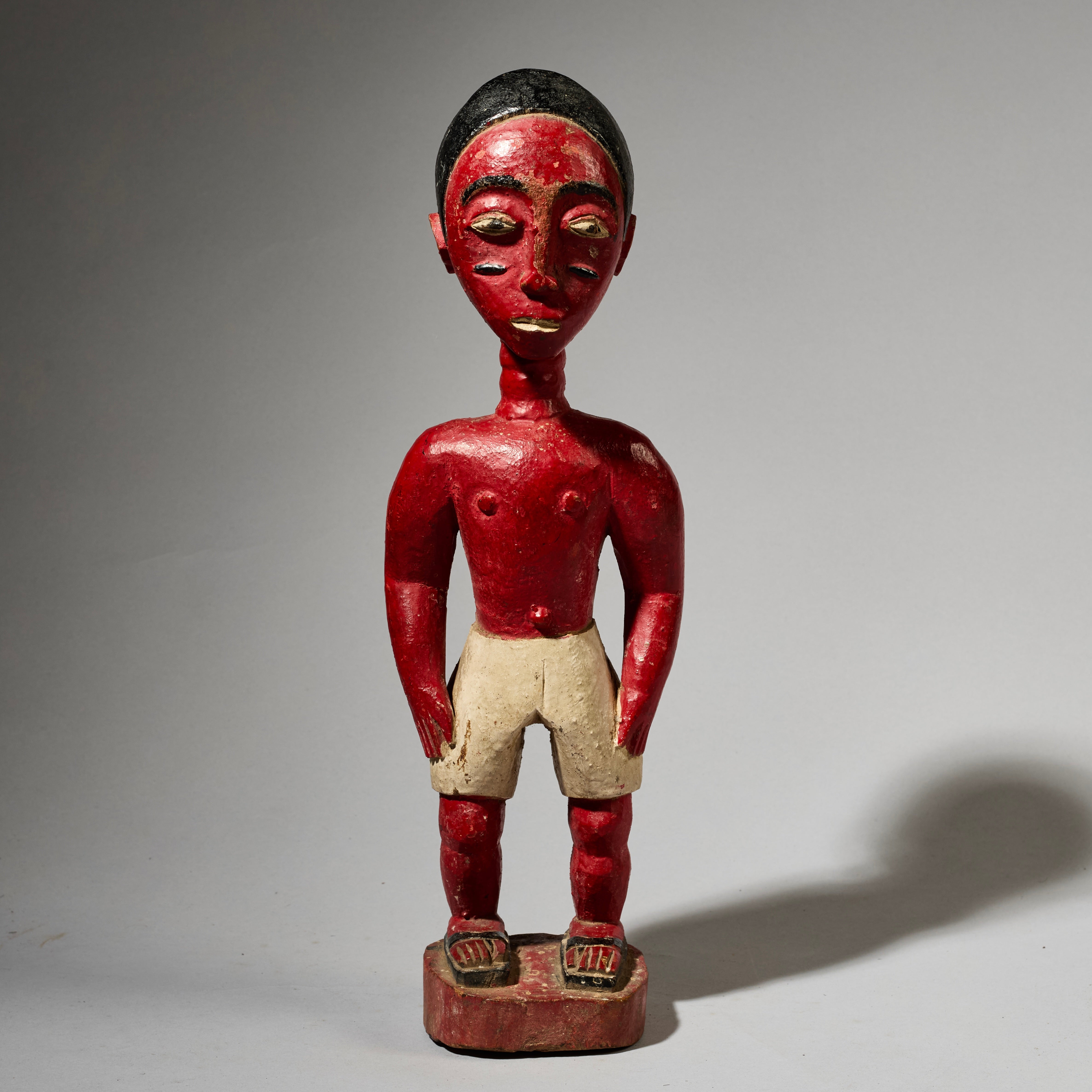 A SCULPTURAL RED COLON FIGURE, BAULE TRIBE IVORY COAST ( No 5000