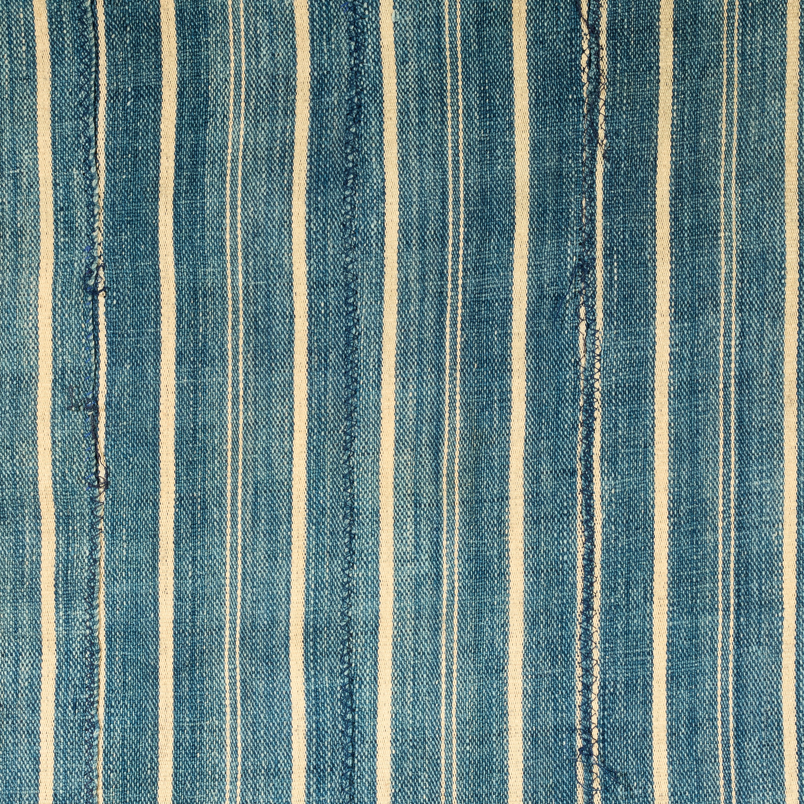 A WELL USED INDIGO STRIPED WOMANS CLOTH, NORTHERN GHANA ( No 5010 )