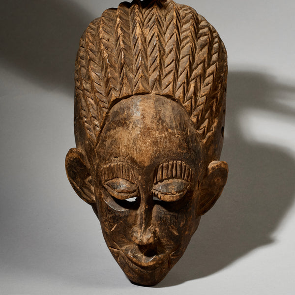 A QUIRKY WELL USED MASK FROM BURKINA FASO  ( No 5034 )