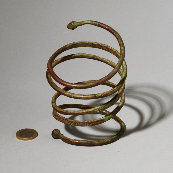 AN ELEMENTAL BRASS COIL BANGLE FROM KIRDI TRIBE CAMEROON, W.AFRICA( No 2202) (Copy)