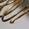 AN ELEMENTAL BRASS COIL BANGLE FROM KIRDI TRIBE CAMEROON, W.AFRICA( No 2202) (Copy)