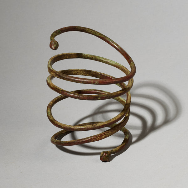 AN ELEMENTAL BRASS COIL BANGLE FROM KIRDI TRIBE CAMEROON, W.AFRICA( No 2202) (Copy)