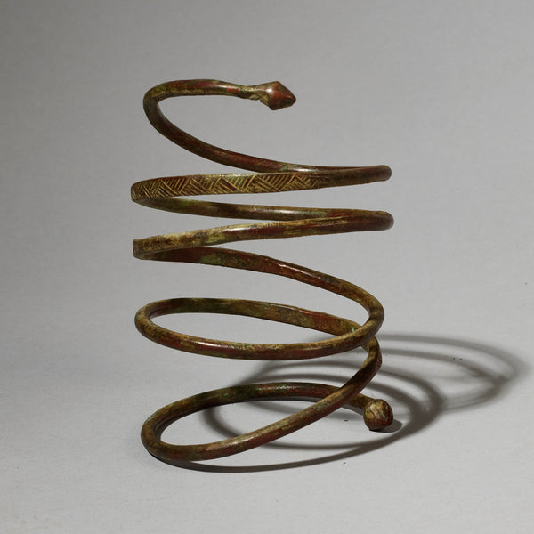AN ELEMENTAL BRASS COIL BANGLE FROM KIRDI TRIBE CAMEROON, W.AFRICA( No 2202) (Copy)