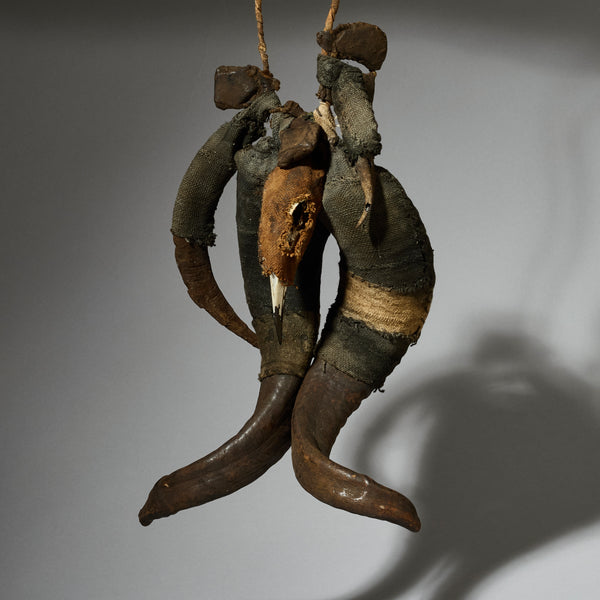 A GNARLY HORN FETISH +METAL CURRENCY FROM CAMEROON W.AFRICA ( No 5070)