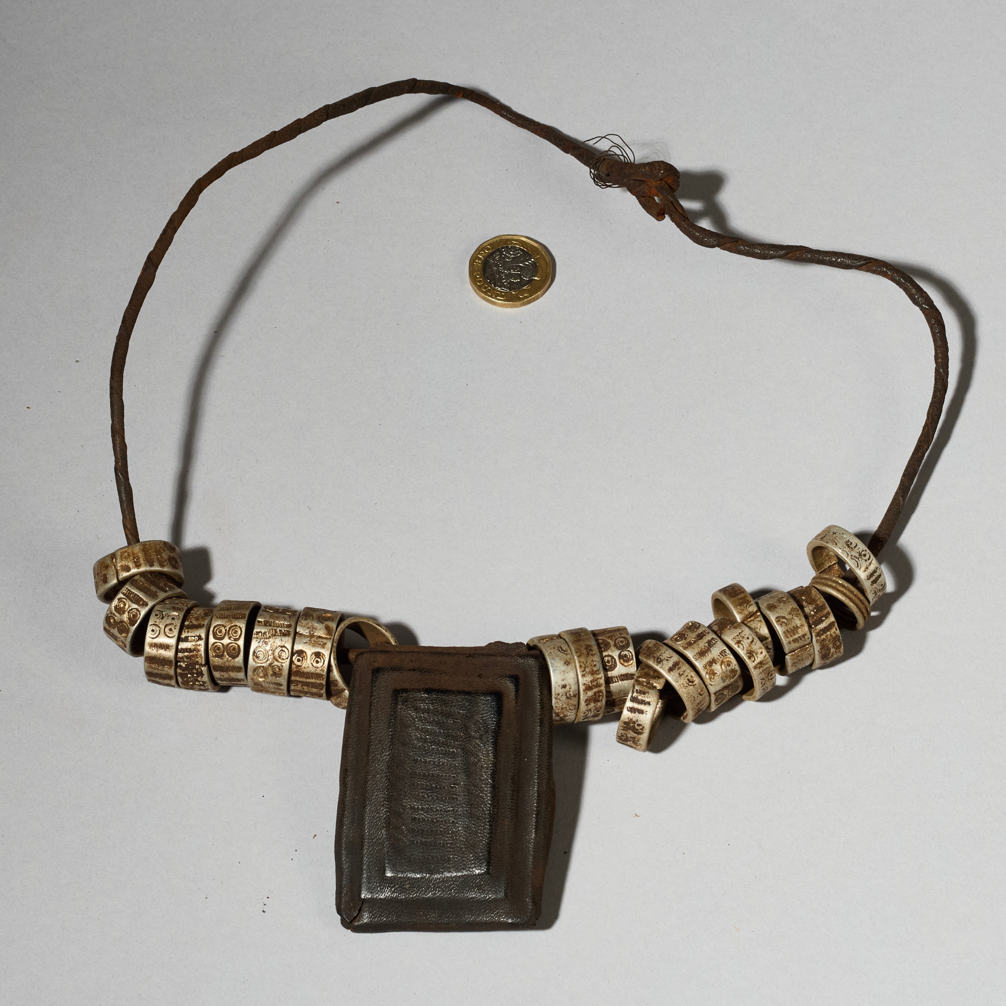 A CHARACTERFUL LEATHER TALISMAN GRIS GRIS NECKLACE, MAMBILLA TRIBE CAMEROUN ( No 5069)