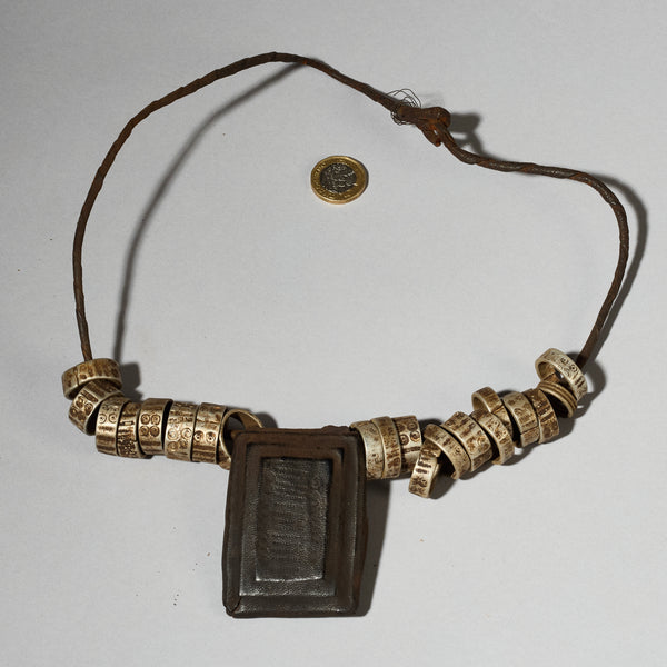 A CHARACTERFUL LEATHER TALISMAN GRIS GRIS NECKLACE, MAMBILLA TRIBE CAMEROUN ( No 5069)