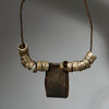 A CHARACTERFUL LEATHER TALISMAN GRIS GRIS NECKLACE, MAMBILLA TRIBE CAMEROUN ( No 5069)
