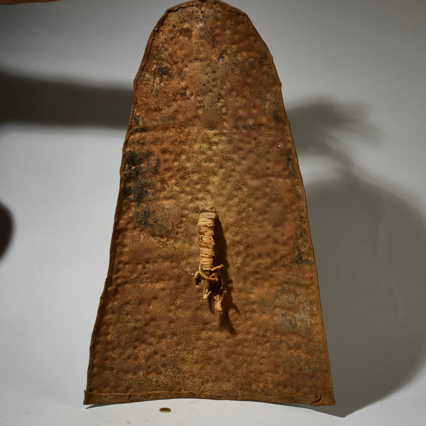AN EMBOSSED, BELL SHAPED SHIELD, KIRDI TRIBE N CAMEROON, W.AFRICA WITH GOOD AGE AND PATINA  ( No 5074)