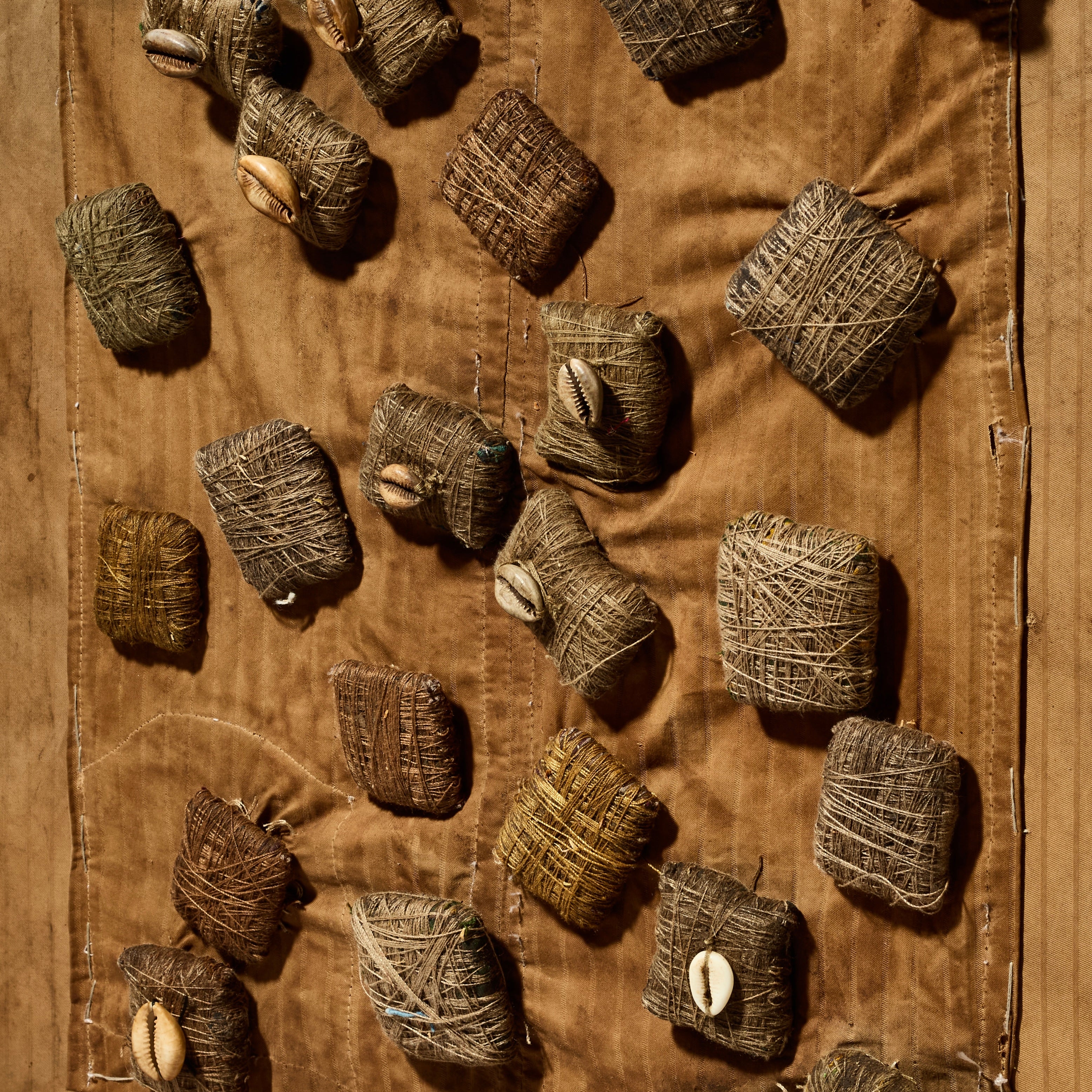 A INTRIGUING MAGIC BUNDLE MOUNTED CLOTH NORTHERN GHANA  ( No 5079 )