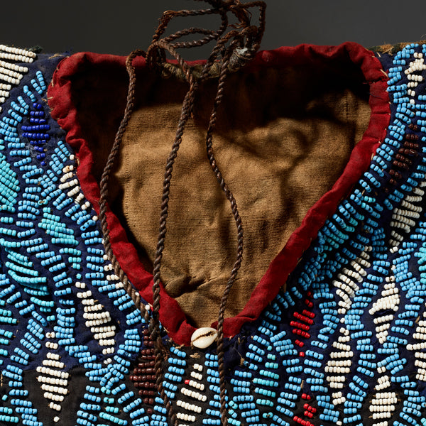 AN ARTISTIC BEADED SHIRT WITH NDOP TRIM, BAMILEKE TRIBE OF CAMEROON ( No 5113 )