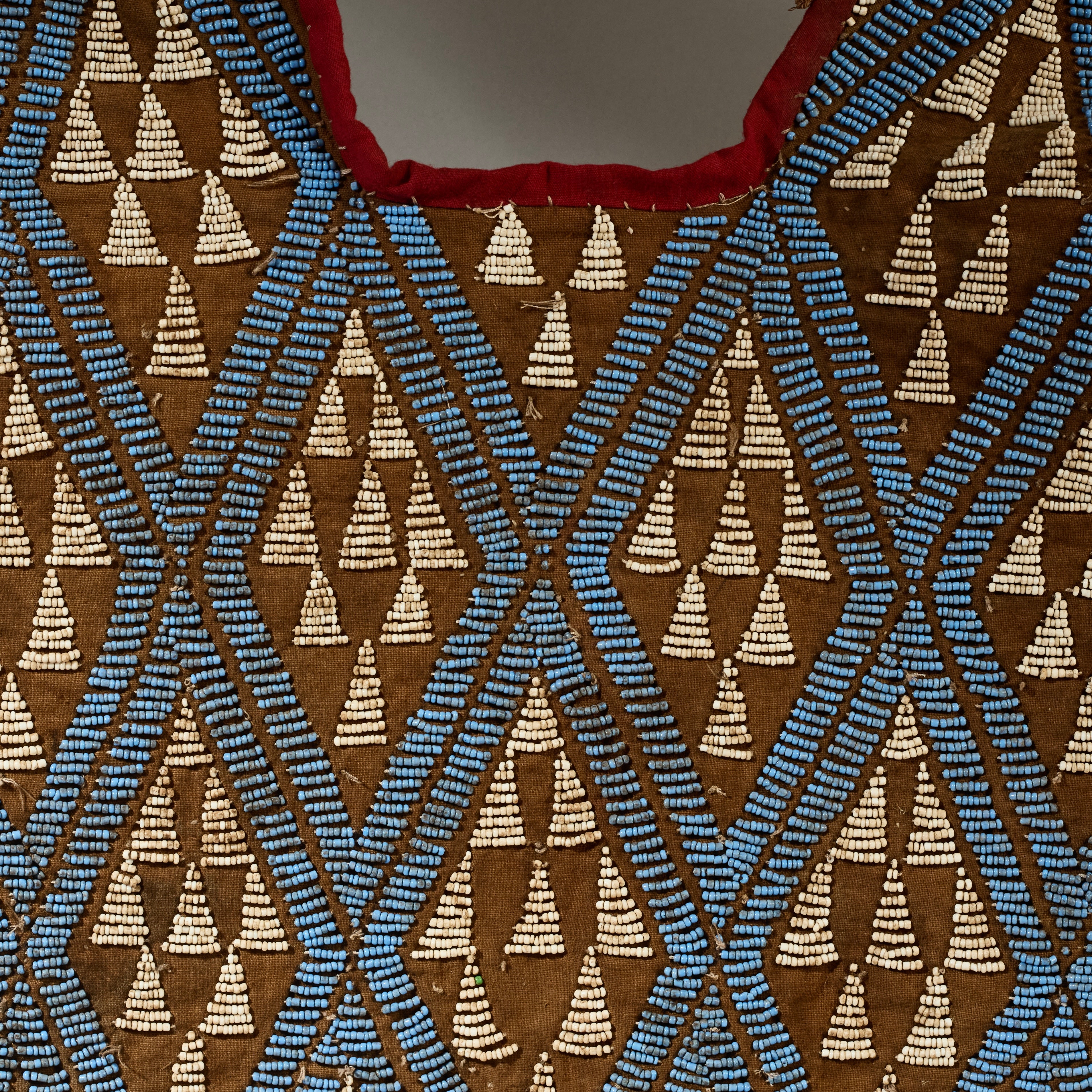 A WONDERFUL LIGHT BLUE BEADED DANCE SHIRT, BAMILEKE TRIBE OF CAMEROON ( No 5089 )