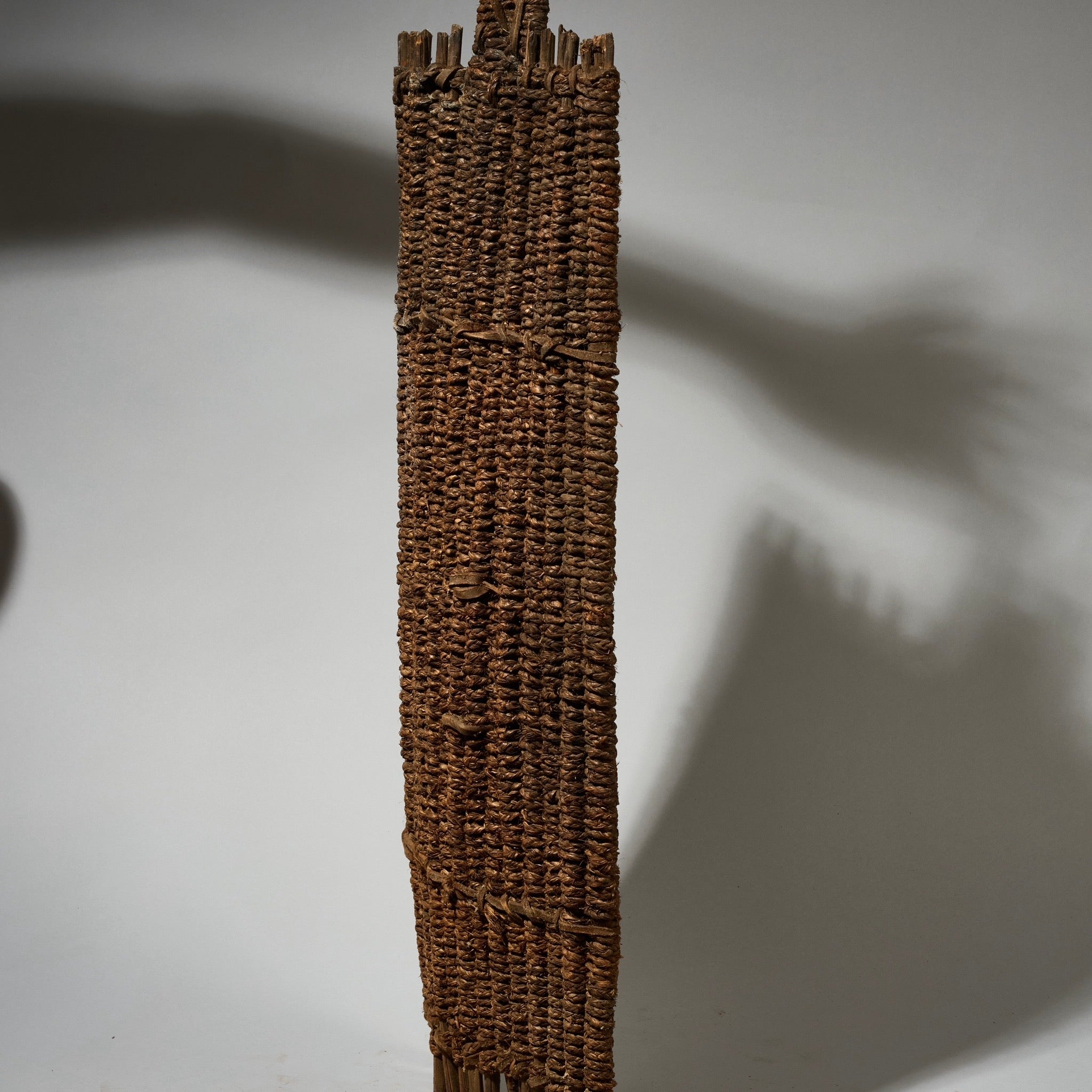 AN EARTHY NATURAL FIBRE SHIELD FROM THE NGOMBE TRIBE OF THE CONGO, EX UK COLLECTION  [ No 5076 )