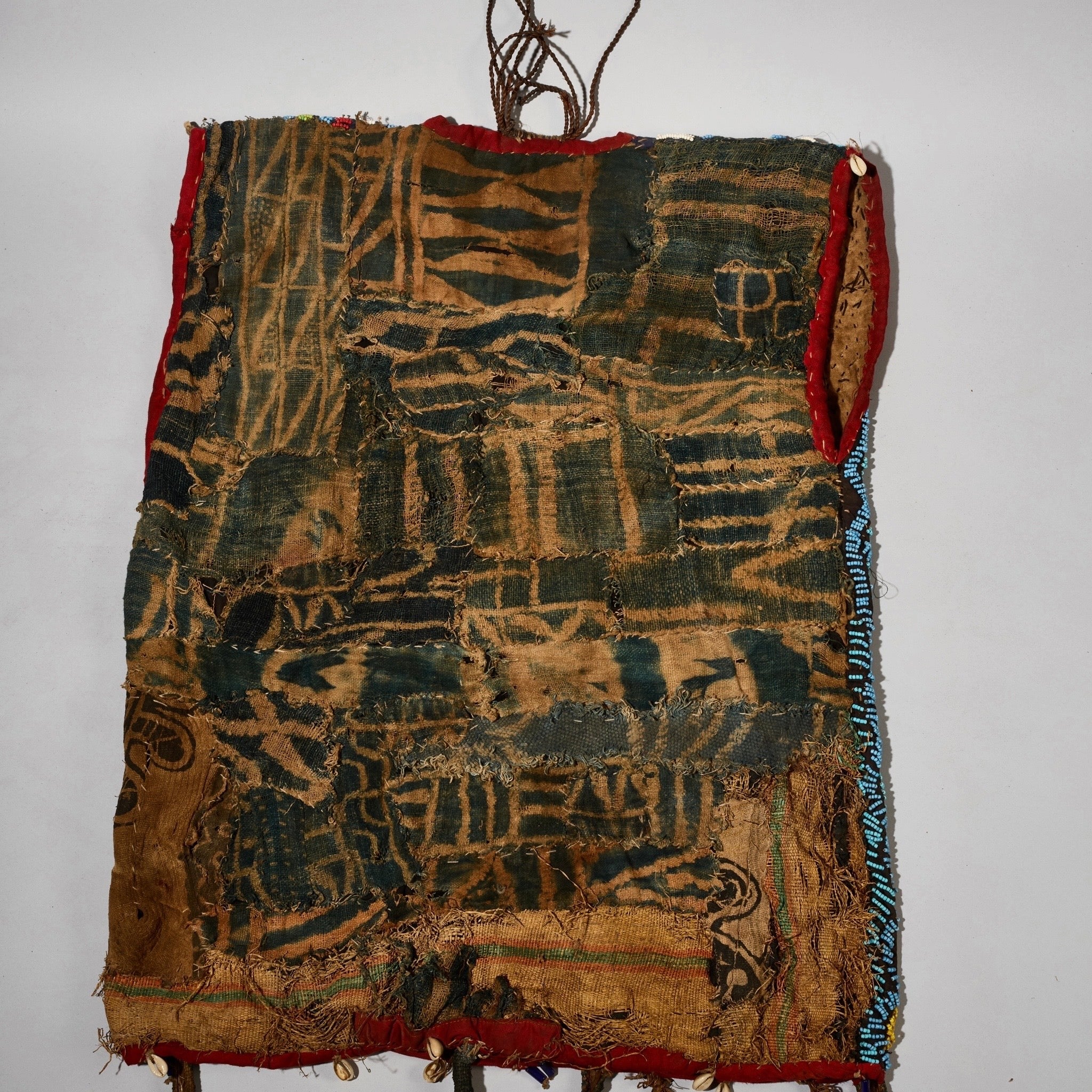 AN ARTISTIC BEADED SHIRT WITH NDOP TRIM, BAMILEKE TRIBE OF CAMEROON ( No 5113 )
